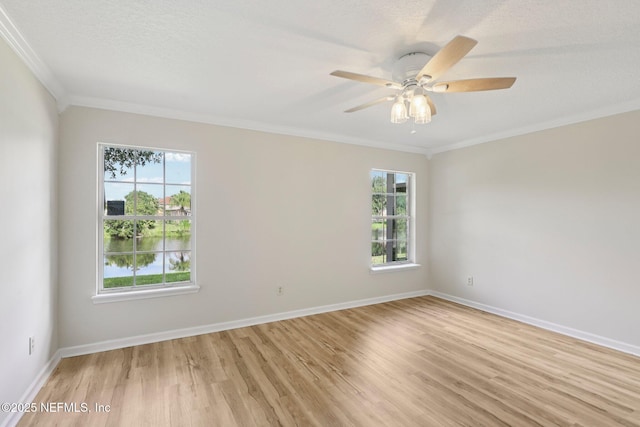 2002 Knottingham Trace Ln, Jacksonville, FL 32246 - unfurnished room with light wood-type flooring, plenty of natural light, ornamental molding, and a ceiling fan