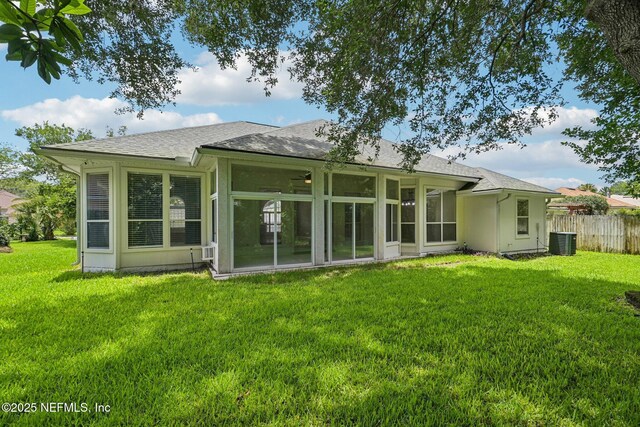 1867 Willesdon Dr E, Jacksonville, FL 32246 - rear view of house with a sunroom and a shingled roof