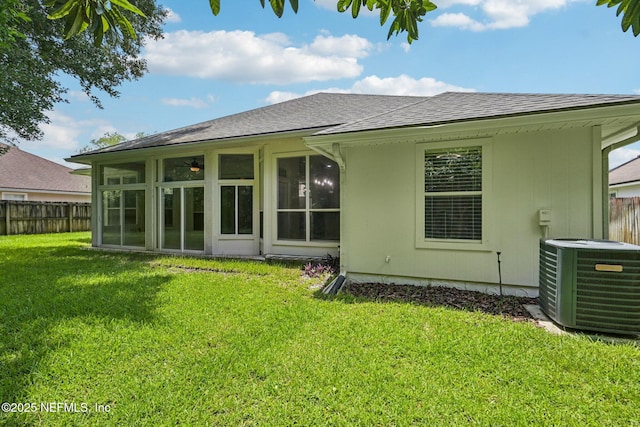 1867 Willesdon Dr E, Jacksonville, FL 32246 - back of property with roof with shingles and a sunroom