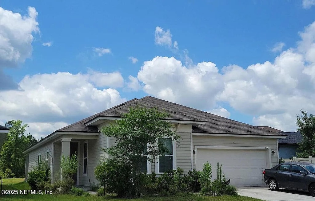 855 Sycamore Way, Orange Park, FL 32073 - ranch-style home featuring a garage and driveway
