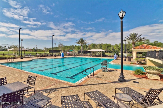 2144 S Sorrento Hills Rd, Saint Augustine, FL 32092 - community pool featuring a gazebo and a patio