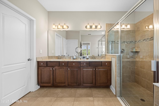 2144 S Sorrento Hills Rd, Saint Augustine, FL 32092 - full bathroom featuring double vanity, a stall shower, and tile patterned flooring