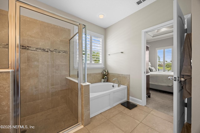 2144 S Sorrento Hills Rd, Saint Augustine, FL 32092 - bathroom featuring ensuite bath, a garden tub, a stall shower, and tile patterned floors