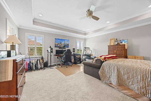2144 S Sorrento Hills Rd, Saint Augustine, FL 32092 - carpeted bedroom featuring crown molding, a raised ceiling, a desk, a ceiling fan, and recessed lighting