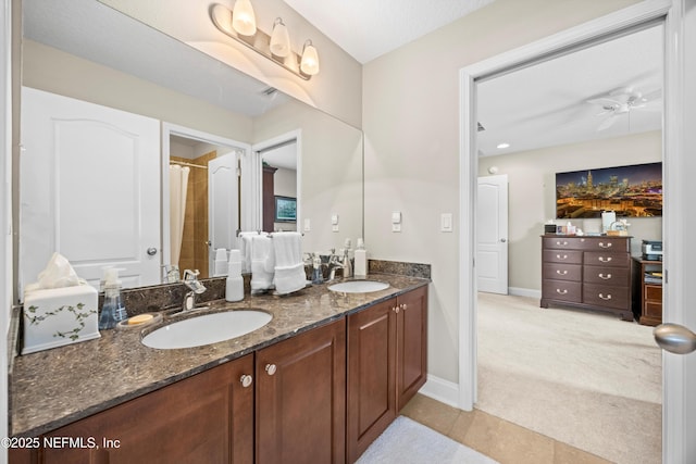 2144 S Sorrento Hills Rd, Saint Augustine, FL 32092 - full bath featuring double vanity, tile patterned flooring, and ceiling fan