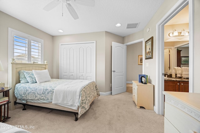 2144 S Sorrento Hills Rd, Saint Augustine, FL 32092 - bedroom featuring a closet, light colored carpet, a ceiling fan, and recessed lighting