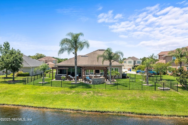 2144 S Sorrento Hills Rd, Saint Augustine, FL 32092 - rear view of property featuring a fenced backyard, a patio, a water view, and a gazebo