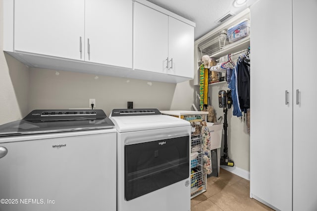 2144 S Sorrento Hills Rd, Saint Augustine, FL 32092 - laundry room featuring cabinet space and washer and clothes dryer
