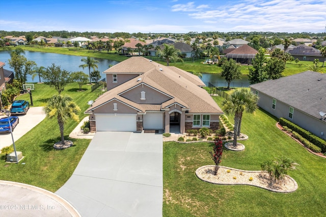 2144 S Sorrento Hills Rd, Saint Augustine, FL 32092 - view of front of property featuring a water view, stone siding, a residential view, and driveway