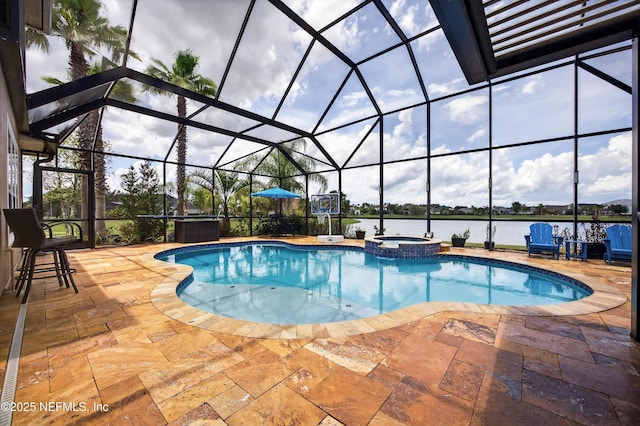 2148 S Sorrento Hills Rd, Saint Augustine, FL 32092 - view of swimming pool featuring a patio, a pool with connected hot tub, a lanai, and a water view