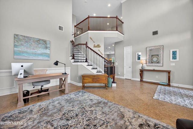 2148 S Sorrento Hills Rd, Saint Augustine, FL 32092 - foyer featuring a towering ceiling, granite tiled floors, and stairs