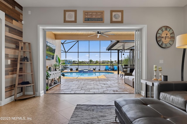 2148 S Sorrento Hills Rd, Saint Augustine, FL 32092 - doorway featuring a sunroom, a ceiling fan, and tile patterned flooring