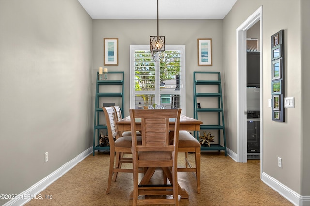 2148 S Sorrento Hills Rd, Saint Augustine, FL 32092 - dining room featuring baseboards and light tile patterned floors