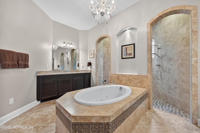 2148 S Sorrento Hills Rd, Saint Augustine, FL 32092 - full bathroom featuring a tub with jets, a walk in shower, vanity, and a chandelier