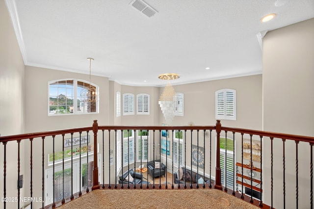 2148 S Sorrento Hills Rd, Saint Augustine, FL 32092 - hallway featuring ornamental molding, a chandelier, recessed lighting, and carpet flooring