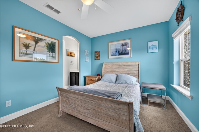 2148 S Sorrento Hills Rd, Saint Augustine, FL 32092 - bedroom with carpet, a ceiling fan, and arched walkways