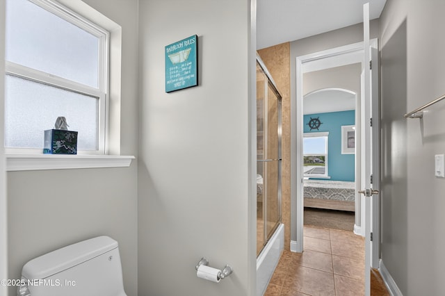 2148 S Sorrento Hills Rd, Saint Augustine, FL 32092 - ensuite bathroom with toilet and tile patterned flooring