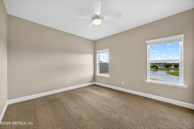 2148 S Sorrento Hills Rd, Saint Augustine, FL 32092 - carpeted empty room featuring baseboards and ceiling fan