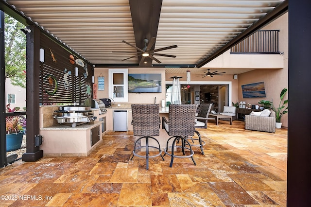 2148 S Sorrento Hills Rd, Saint Augustine, FL 32092 - view of patio / terrace with an outdoor kitchen, ceiling fan, and exterior bar