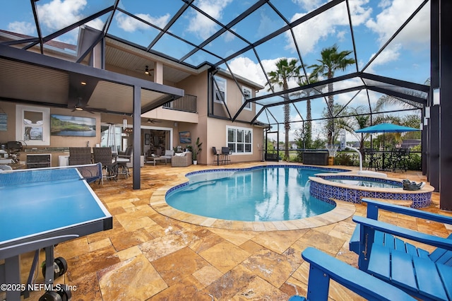 2148 S Sorrento Hills Rd, Saint Augustine, FL 32092 - view of swimming pool with a ceiling fan, a patio area, a pool with connected hot tub, glass enclosure, and an outdoor hangout area