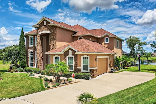 2148 S Sorrento Hills Rd, Saint Augustine, FL 32092 - mediterranean / spanish home with stucco siding, stone siding, a front yard, and concrete driveway