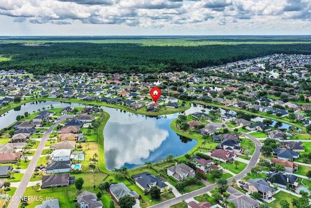 2148 S Sorrento Hills Rd, Saint Augustine, FL 32092 - aerial view of residential area with a heavily wooded area and a nearby body of water