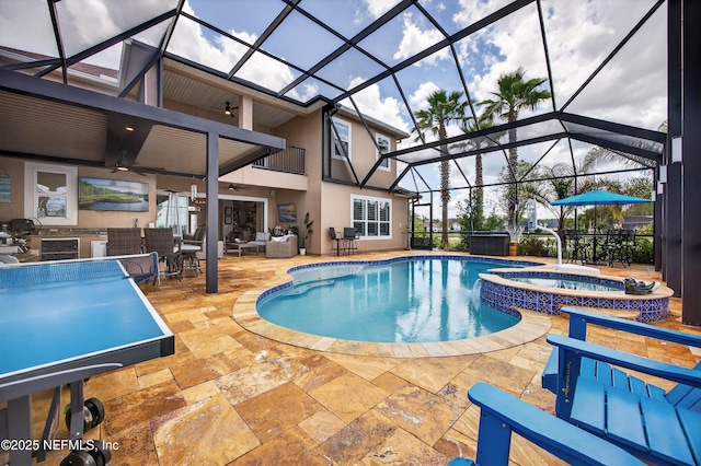 2148 S Sorrento Hills Rd, Saint Augustine, FL 32092 - view of swimming pool with ceiling fan, a patio area, a pool with connected hot tub, glass enclosure, and outdoor lounge area