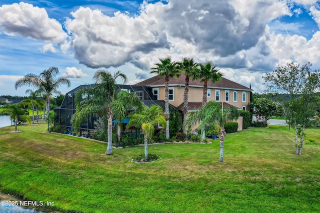 2148 S Sorrento Hills Rd, Saint Augustine, FL 32092 - view of front facade featuring stucco siding, a front lawn, and a lanai