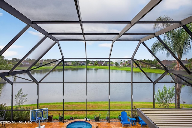 2148 S Sorrento Hills Rd, Saint Augustine, FL 32092 - view of pool featuring a water view, a jacuzzi, glass enclosure, and a patio area