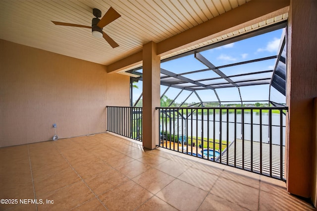 2148 S Sorrento Hills Rd, Saint Augustine, FL 32092 - view of patio / terrace with a water view, a ceiling fan, and glass enclosure