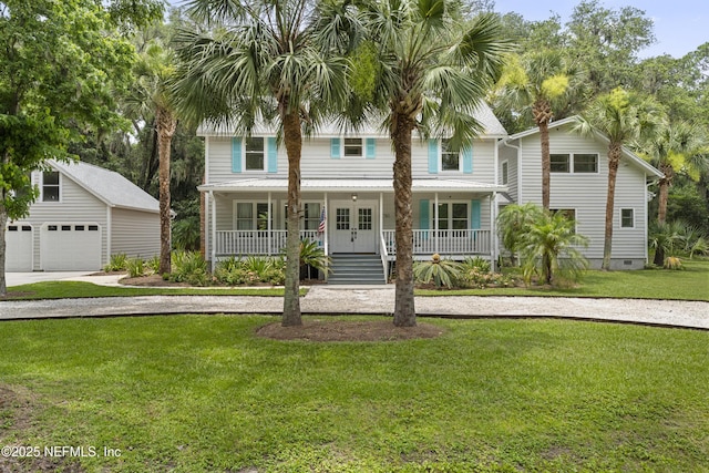 1381 Forrest Dr, Fernandina Beach, FL 32034 - view of front of house featuring covered porch, a front yard, concrete driveway, an outdoor structure, and crawl space
