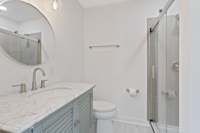 1381 Forrest Dr, Fernandina Beach, FL 32034 - bathroom with vanity, toilet, a tile shower, and baseboards