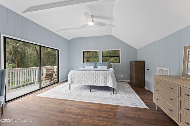 1381 Forrest Dr, Fernandina Beach, FL 32034 - bedroom with access to outside, lofted ceiling, dark wood-style floors, a ceiling fan, and wooden walls