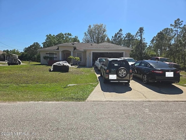 7811 Taplin Ave, North Port, FL 34291 - single story home with driveway, a front yard, and a garage