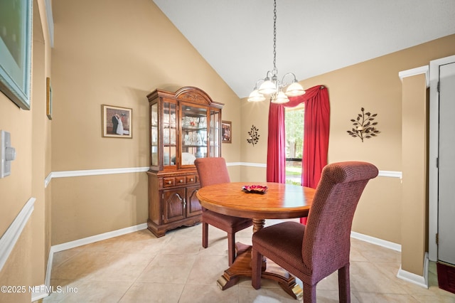 10571 Fox Squirrel Ct, Jacksonville, FL 32257 - dining space featuring a chandelier, light tile patterned flooring, and high vaulted ceiling