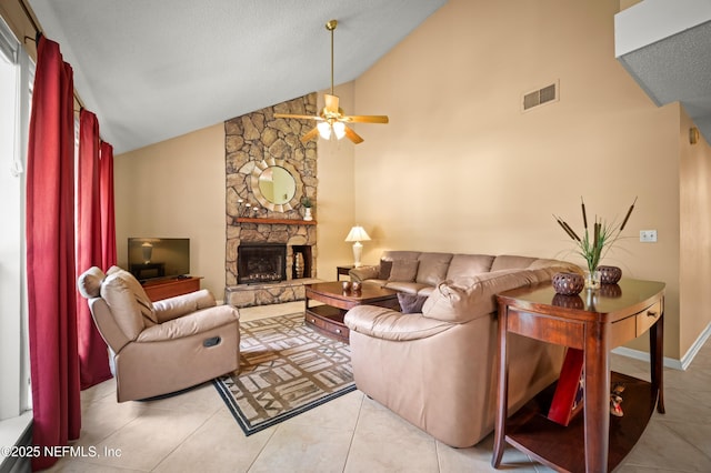 10571 Fox Squirrel Ct, Jacksonville, FL 32257 - living area featuring a ceiling fan, a fireplace, high vaulted ceiling, and light tile patterned floors