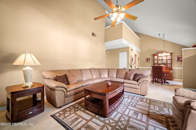 10571 Fox Squirrel Ct, Jacksonville, FL 32257 - living room with a chandelier, high vaulted ceiling, and ceiling fan
