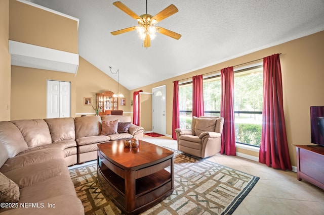 10571 Fox Squirrel Ct, Jacksonville, FL 32257 - living area with a chandelier, ceiling fan, light tile patterned floors, and high vaulted ceiling