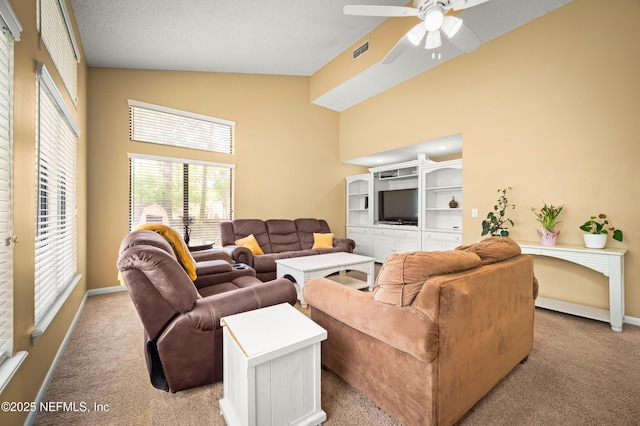 10571 Fox Squirrel Ct, Jacksonville, FL 32257 - living room with light carpet, high vaulted ceiling, and ceiling fan