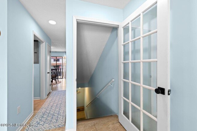 3145 Coastal Hwy Unit 1162, Saint Augustine, FL 32084 - hallway with an upstairs landing and baseboards