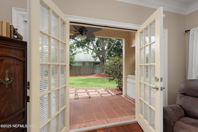 1766 Buttonbush Way, Fleming Island, FL 32003 - doorway with a ceiling fan and crown molding