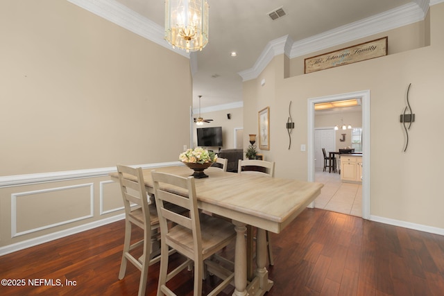 1766 Buttonbush Way, Fleming Island, FL 32003 - dining space featuring a chandelier, ornamental molding, hardwood / wood-style floors, and recessed lighting