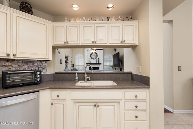 1766 Buttonbush Way, Fleming Island, FL 32003 - kitchen with dishwashing machine, dark countertops, a ceiling fan, light tile patterned floors, and recessed lighting