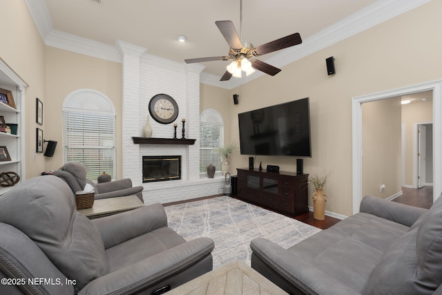 1766 Buttonbush Way, Fleming Island, FL 32003 - living area with ceiling fan, crown molding, wood finished floors, and a brick fireplace