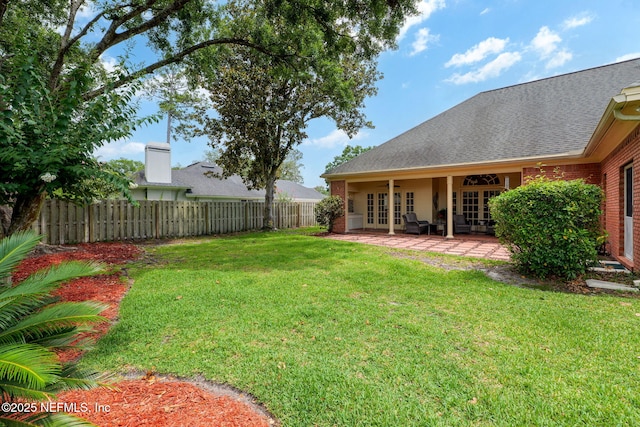 1766 Buttonbush Way, Fleming Island, FL 32003 - view of yard featuring french doors, a patio area, and ceiling fan