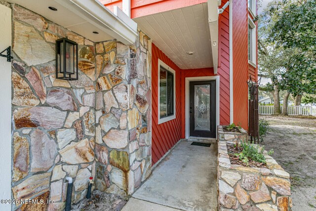 4 Santa Maria Ln, Saint Augustine, FL 32080 - view of exterior entry with stone siding