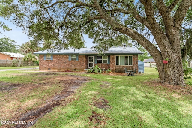 97150 Caravel Trl, Yulee, FL 32097 - ranch-style home featuring brick siding, crawl space, and metal roof