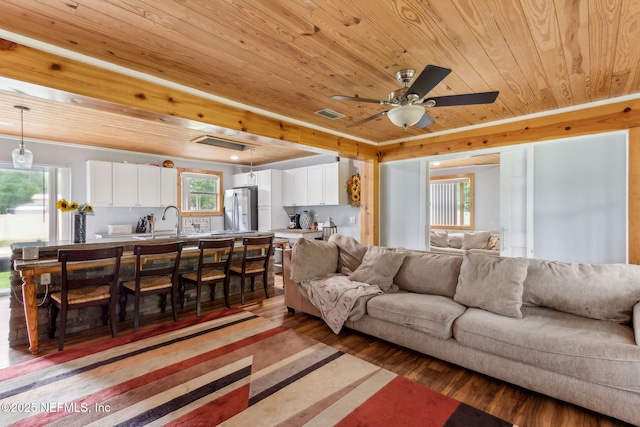 97150 Caravel Trl, Yulee, FL 32097 - living area featuring wooden ceiling, light wood-type flooring, and ceiling fan