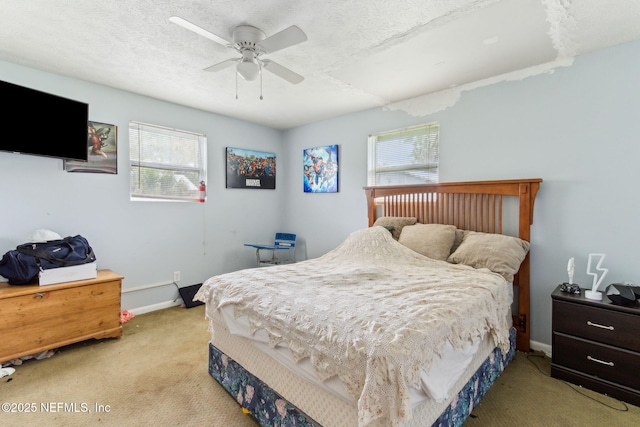 97150 Caravel Trl, Yulee, FL 32097 - bedroom featuring carpet flooring, baseboards, ceiling fan, and a textured ceiling