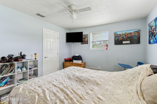 97150 Caravel Trl, Yulee, FL 32097 - bedroom featuring ceiling fan and a textured ceiling